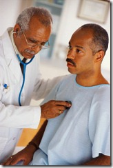 1999 --- Listening to Patient's Heartbeat with Stethoscope --- Image by © Michael Keller/CORBIS